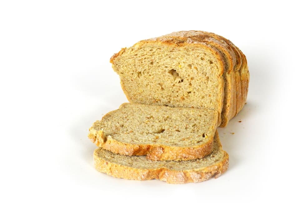 Freshly baked bread with slices