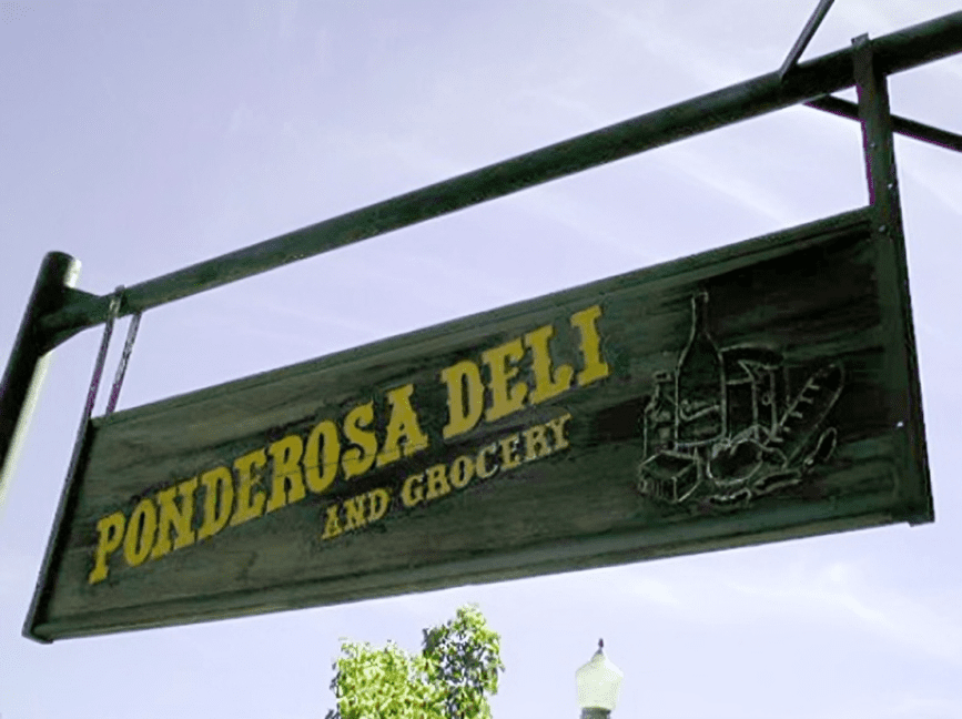 Outdoor sign for Ponderosa Deli and Grocery